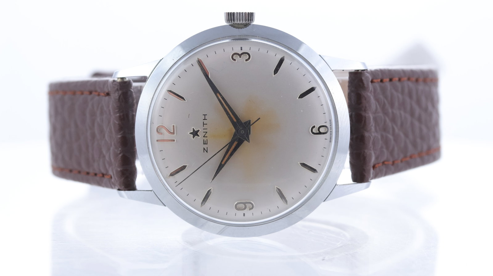 Vintage Zenith Automatic Watch Circa 1950's: Brand: Zenith Model Name: Dress Watch Movement type: Automatic Movement calibre: Zenith 2522 Year: Circa 1950's Dial shape: Circular Dial colour: Silver Dial features: Patina to the dial from the hand