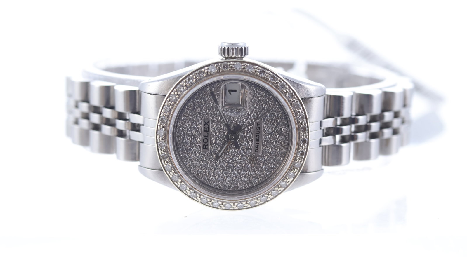 Ladies Rolex Datejust 26 Ref 69174 Circa 1988: Brand: Rolex Model Name: Datejust 26 Reference: 69174 Movement type: Automatic Movement calibre: Rolex 2135 Year: Circa 1988 Dial shape: Circular Dial colour: Diamonds Dial features: Aftermarket diamo