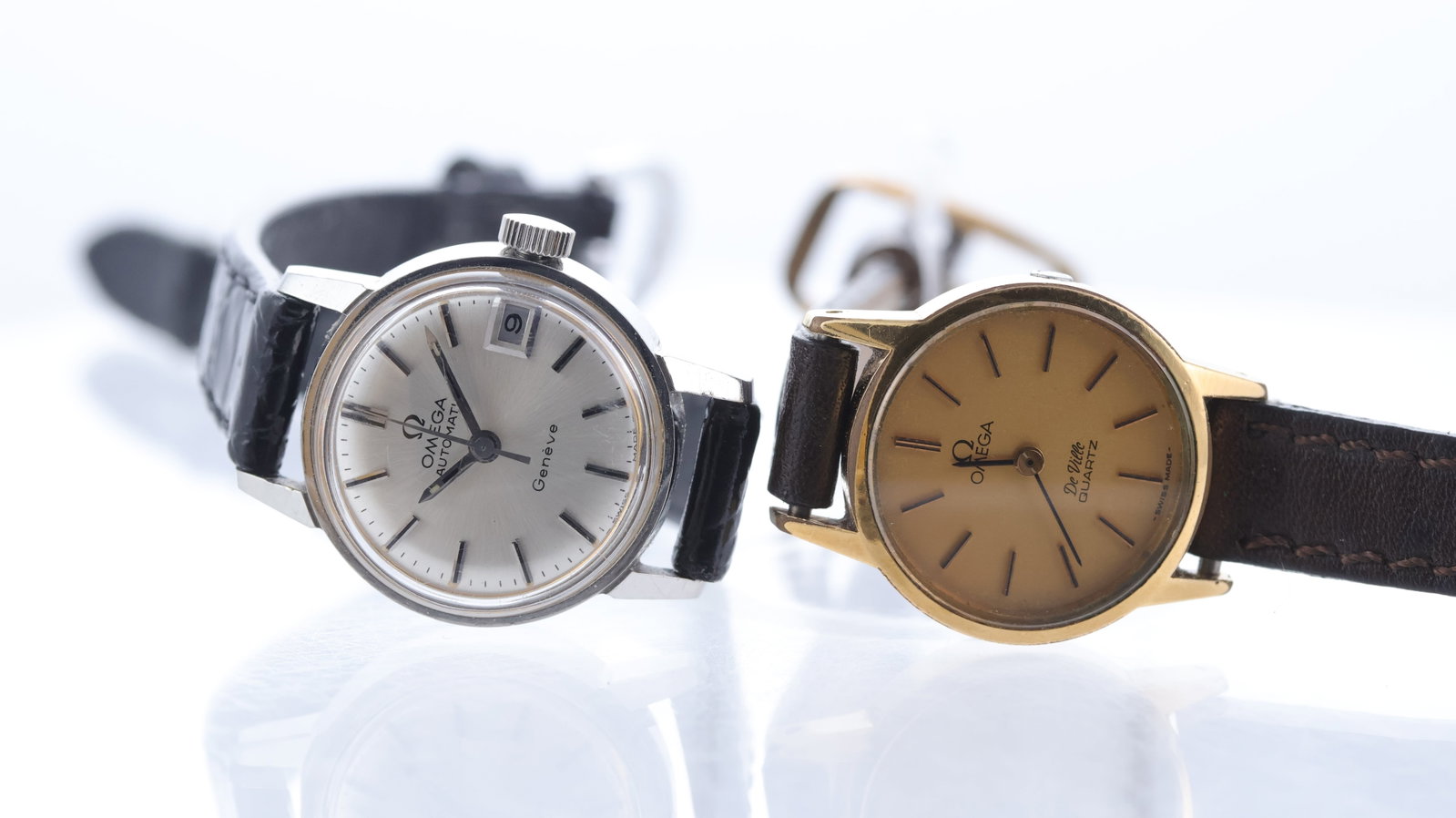 2x Ladies Omega Wristwatches: 2x Ladies Omega Wristwatches. Ladies gold plated Omega DeVille quartz, currently running, after market strap with an Omega buckle. In good condition. *button crown appears to not be running.* Omega Ge