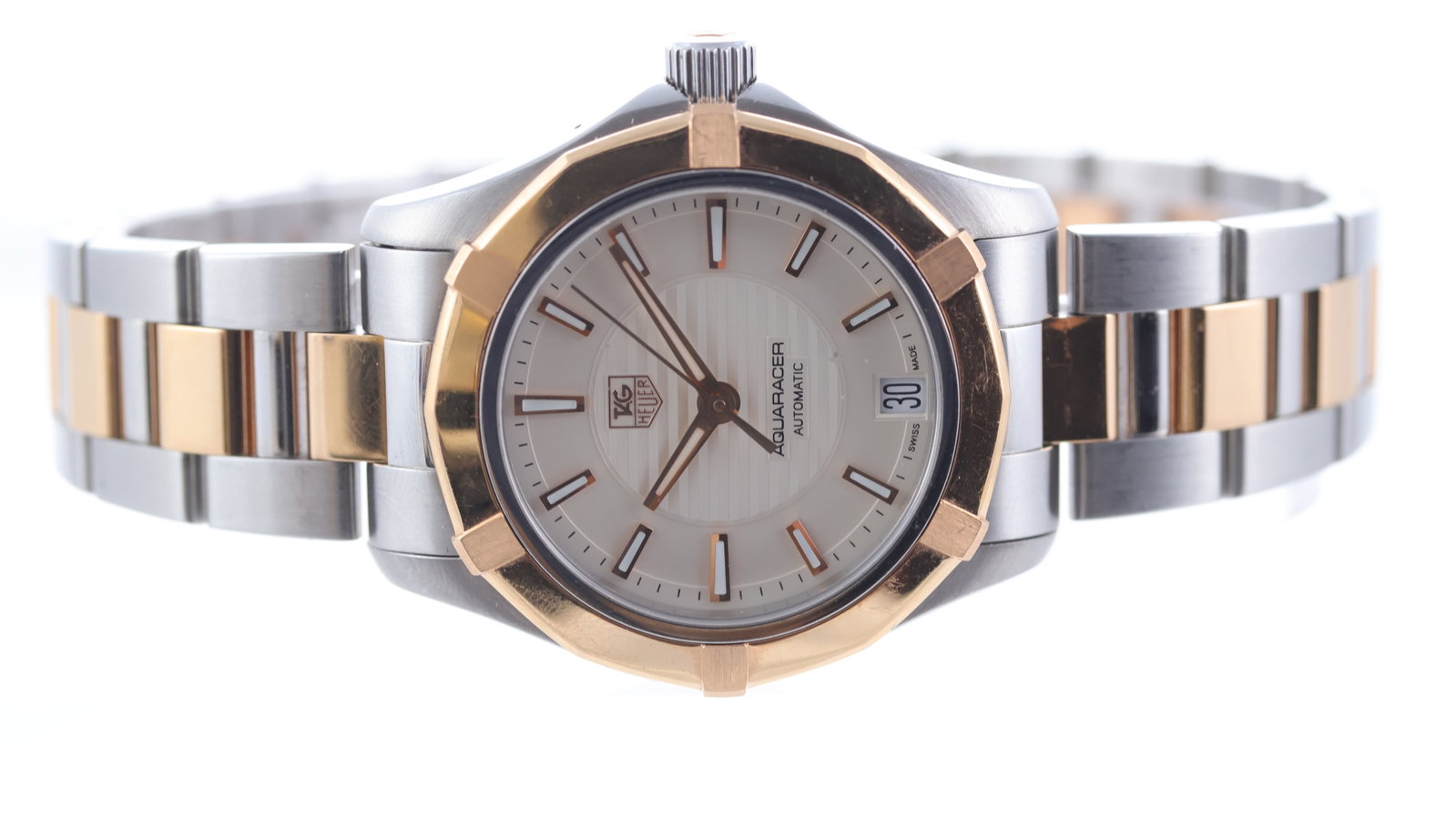 Tag Heuer Aquaracer Ref WAP2350: Brand: Tag Heuer Model Name: Aquaracer Reference: WAP2350 Movement type: Automatic Movement calibre: Tag Heuer 5 Dial shape: Circular Dial colour: Cream Dial features: Baton hour markers, quickset dat