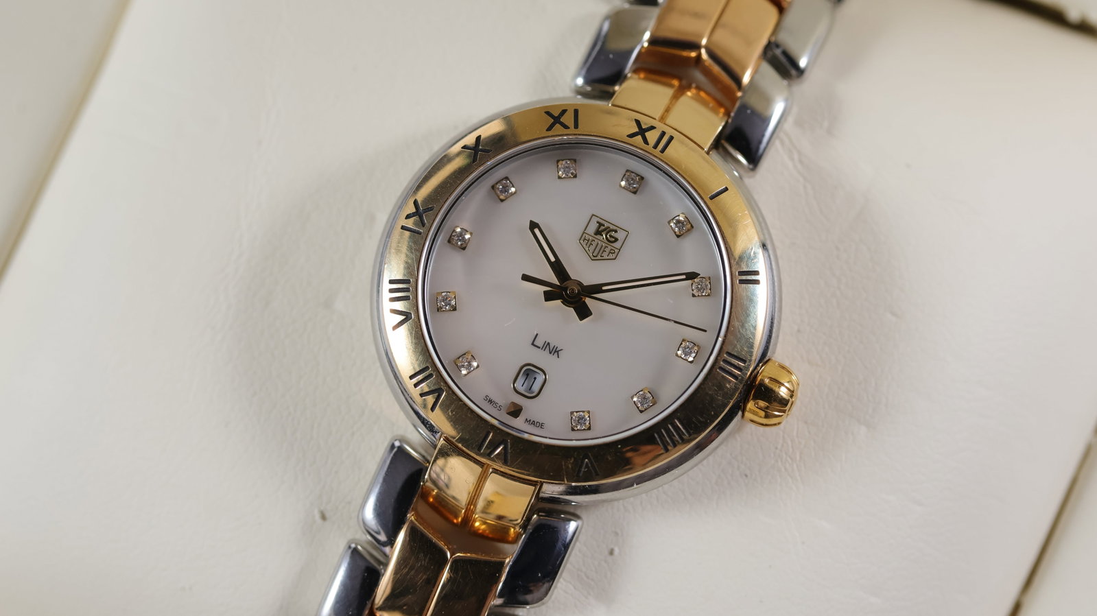 Tag Heuer Link Ref WAT1455 with Box and Papers: Brand: Tag Heuer Model Name: Link Reference: WAT1455 Movement type: Quartz Box: Accompanying Box Box features: Tag Heuer inner and outer box Papers: Guarantee Papers & Booklets Papers features: Black 
