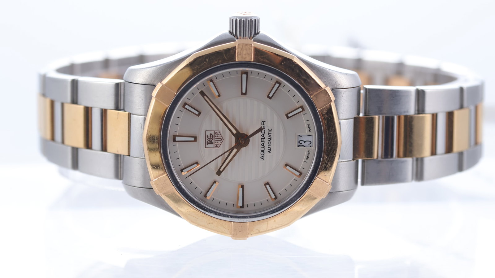 Tag Heuer Aquaracer Ref WAP2350: Brand: Tag Heuer Model Name: Aquaracer Reference: WAP2350 Movement type: Automatic Movement calibre: Tag Heuer 5 Dial shape: Circular Dial colour: Cream Dial features: Baton hour markers, quickset dat