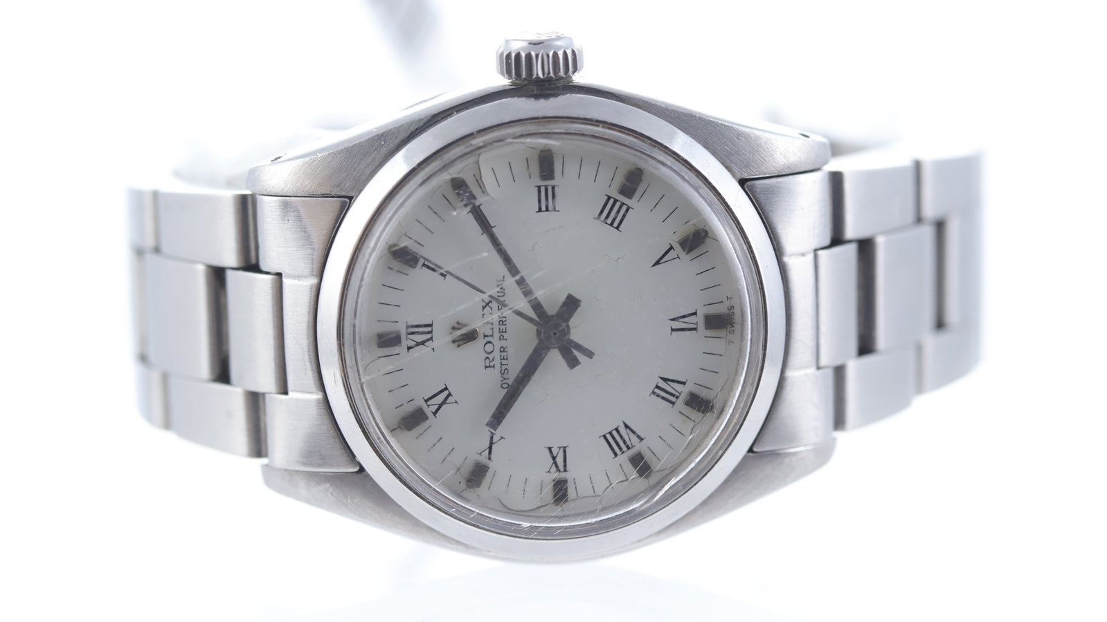 Vintage Rolex Oyster Perpetual 31 Ref 6748 with Papers Circa 1978: Brand: Rolex Model Name: Oyster Perpetual Reference: 6748 Movement type: Automatic Movement calibre: Rolex 2030 Year: Circa 1978 Papers: Warranty Papers Dial shape: Circular Dial colour: White Dial fe