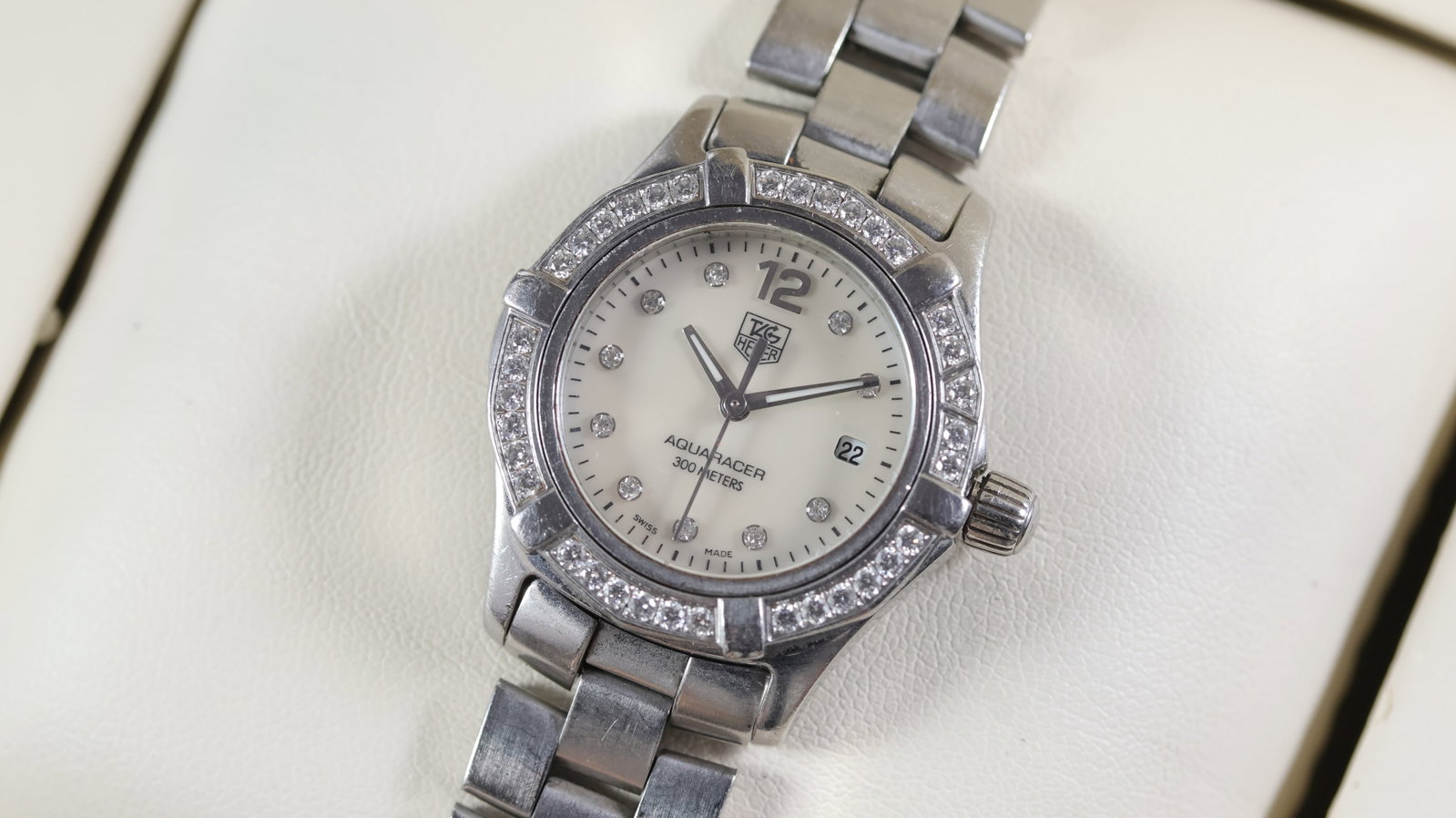Tag Heuer Aquaracer Ref WAF1416: Brand: Tag Heuer Model Name: Aquaracer Reference: WAF1416 Movement type: Quartz Box: Inner and outer box Dial shape: Circular Dial colour: Mother of Pearl Dial features: Dot diamond hour markers. Quic
