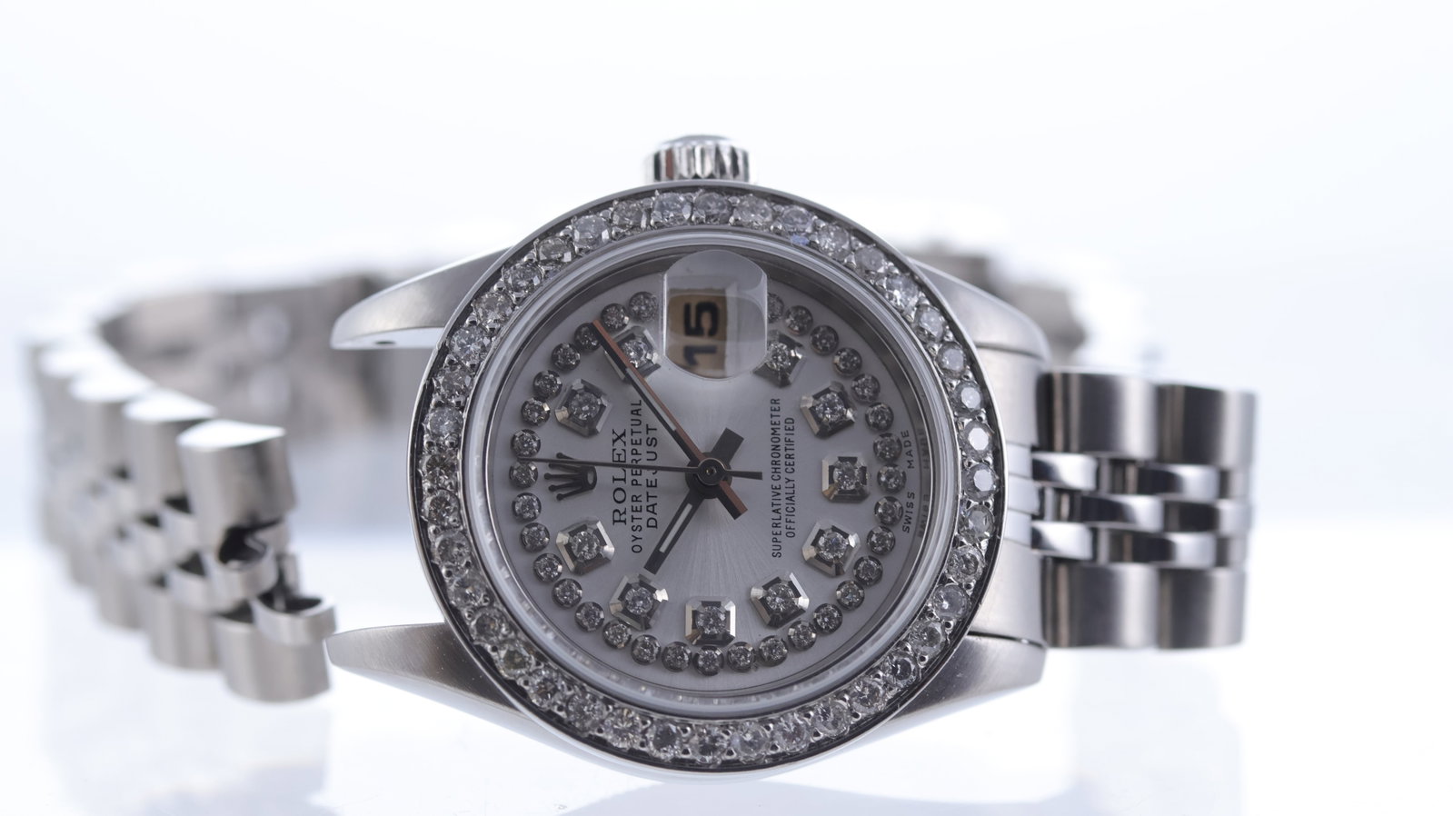 Ladies Rolex Oyster Perpetual Date Ref 79190 Circa 2005: Brand: Rolex Model Name: Oyster Perpetual Reference: 79190 Movement type: Automatic Movement calibre: Rolex 2135 Year: Circa 2005 Dial shape: Circular Dial colour: Silver Dial features: Aftermarket da