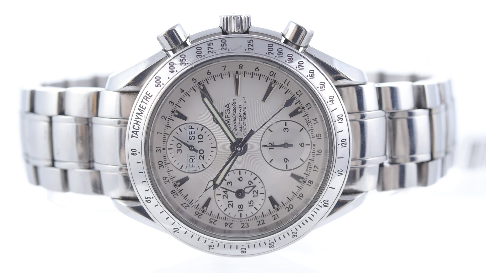 Omega Speedmaster Triple Calendar Ref 3221.30.00: Brand: Omega Model Name: Speedmaster Triple Calendar Reference: 3221.30.00 Movement type: Automatic Movement calibre: Omega 3606 Dial shape: Circular Dial colour: Silver Dial features: Sunburst dial. 
