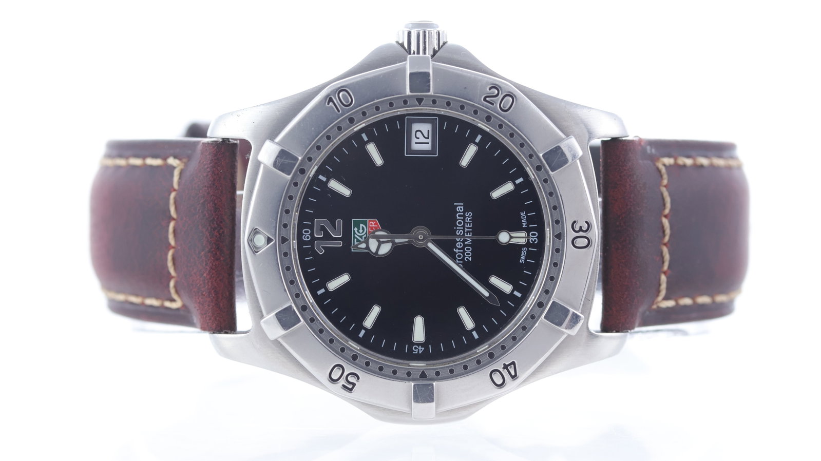Tag Heuer Professional 2000 Ref WK1110-0: Brand: Tag Heuer Model Name: Professional 2000 Reference: WK1110-0 Movement type: Quartz Dial shape: Circular Dial colour: Black Dial features: Silver/Lume hands and hour