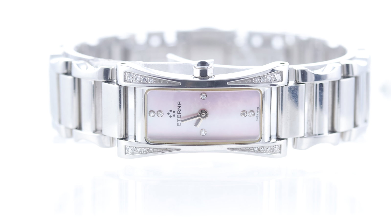 Ladies Eterna Sahida Quartz Ref 2610.49 with Papers 2002: Brand: Eterna Model Name: Sahida Reference: 2610.49 Movement type: Quartz Year: 2002 Papers: Warranty Papers Dial shape: Rectangular Dial colour: Mother of Pearl Dial features: Pink MOP dial. Diamond