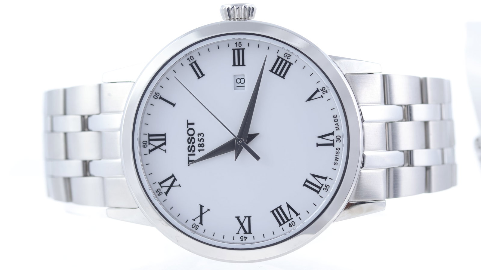 Tissot Classic Dream Ref T129410A: Brand: Tissot Model Name: Classic Dream Reference: T129410A Movement type: Quick Set Date Dial shape: Circular Dial colour: White Dial features: Roman numeral hour markers and a date aperture at 3