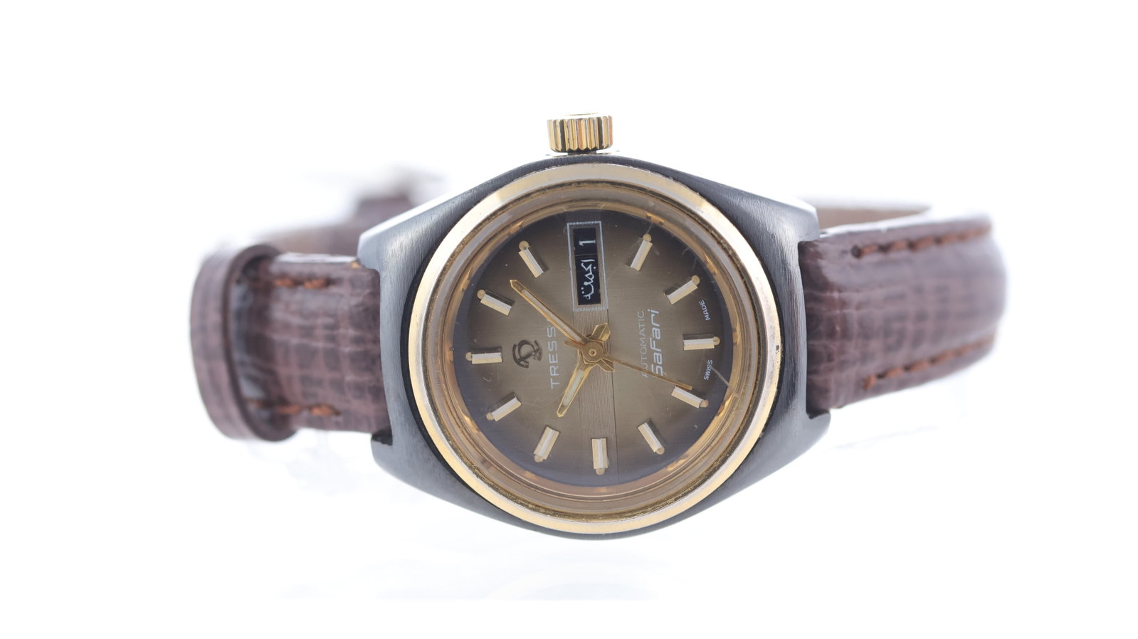 Ladies Tressa Safari Automatic: Brand: Tressa Model Name: Safari Movement type: Automatic Dial shape: Circular Dial colour: Fume Dial features: Applied baton hour markers. Day & Date aperture. Bezel: Smooth, plated bezel. Case
