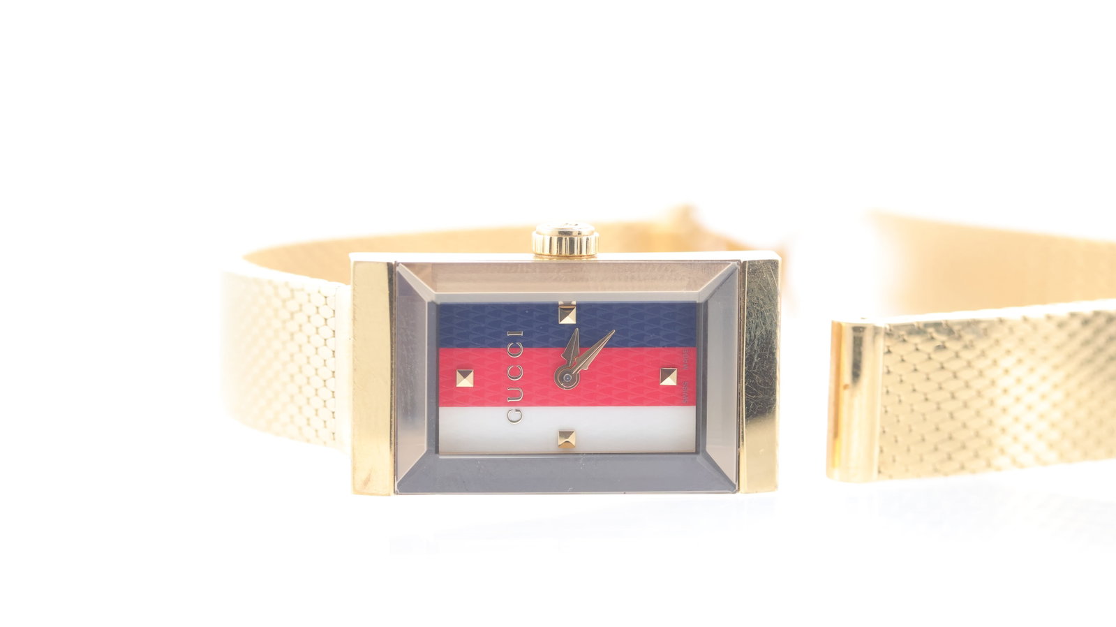 Gucci Quartz Ref 147.5: Brand: Gucci Model Name: Quartz Reference: 147.5 Movement type: Quartz Dial shape: Rectangular Dial colour: Multi Coloured Dial features: Square markers Case size: 14 Case material: Gold plated Case