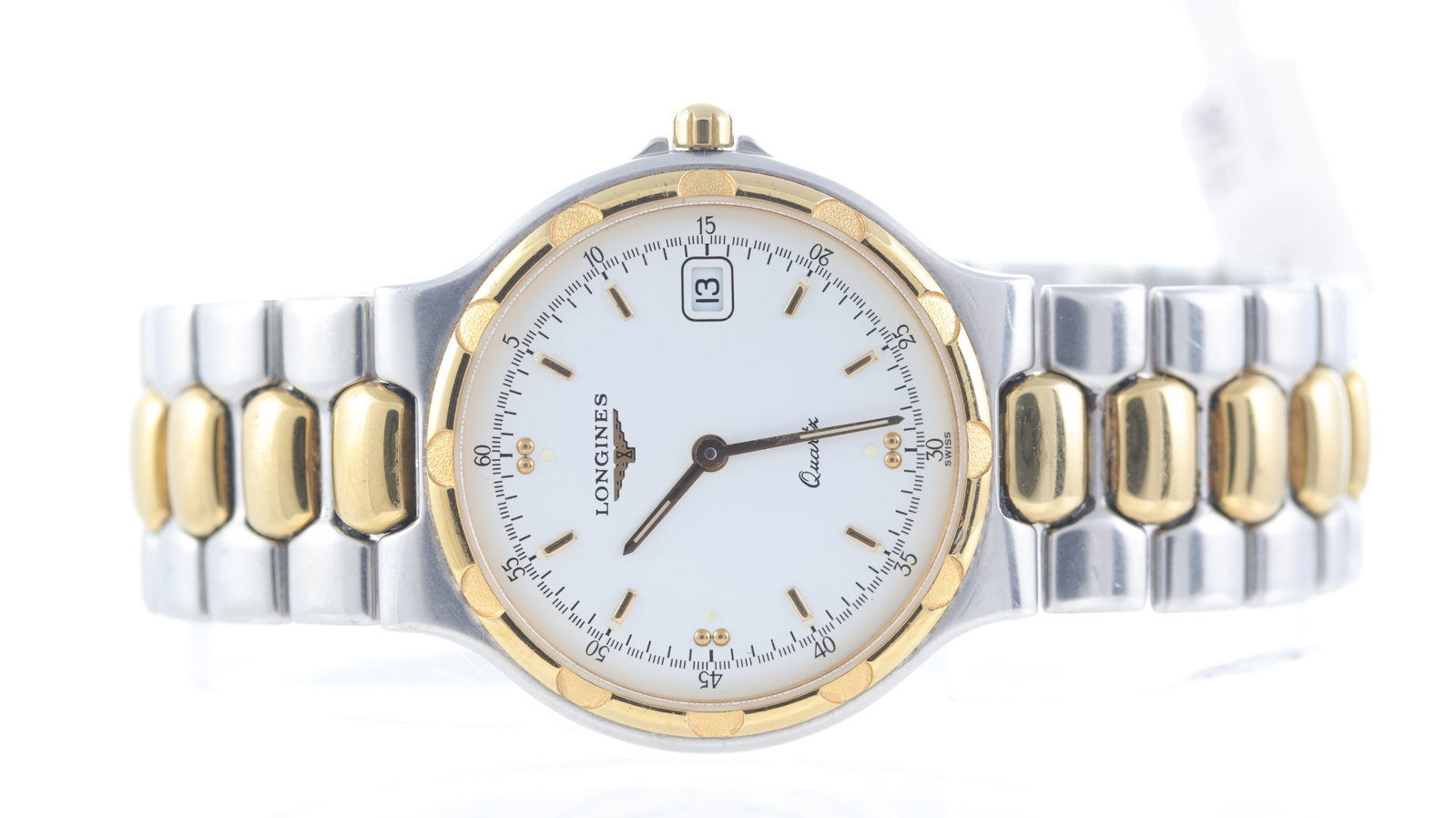Longines Conquest Quartz Ref L1.614.3: Brand: Longines Model Name: Conquest Reference: L1614.3 Movement type: Quartz Dial shape: Circular Dial colour: White Dial features: Gold tone hands and baton hour markers. Date aperture at 3