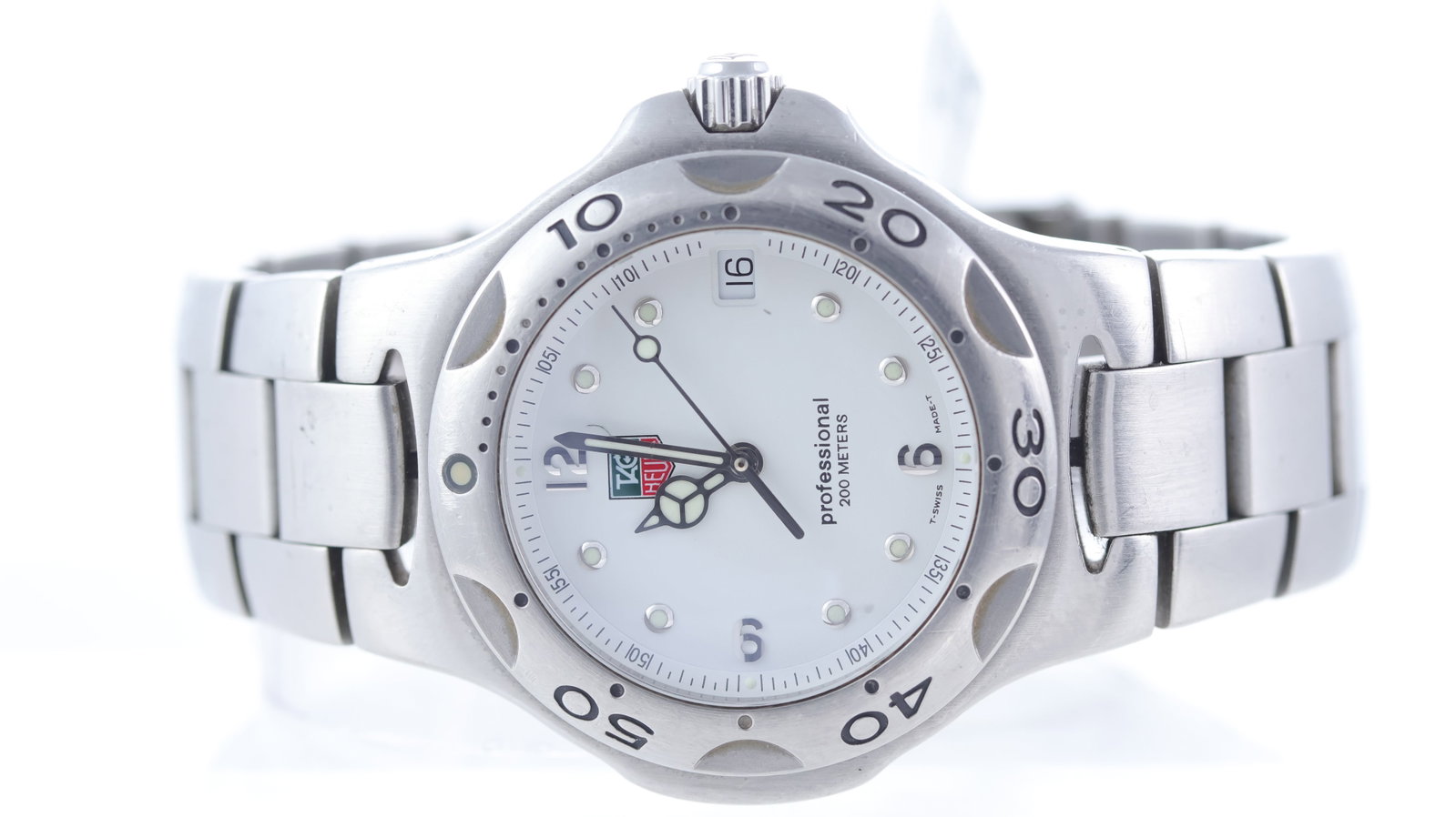 Tag Heuer Kirium Ref WL1110: Brand: Tag Heuer Model Name: Kirium Reference: WL1110 Movement type: Quartz Dial shape: Circular Dial colour: White Dial features: Lume dot/silver arabic numeral hour markers. Bezel: Uni directional