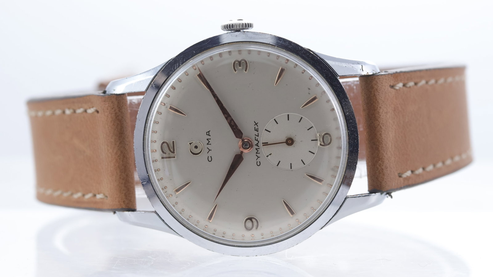 Cyma Cymaflex Vigzol Oil Ref 1430 Circa 1957: Brand: CymaModel Name: CymaflexReference: 1430Movement type: Manual WindMovement calibre: Cyma R.458Movement features: Cyma/Tavennes signed movementYear: Circa 1957Dial shape: CircularDial colour: Sil