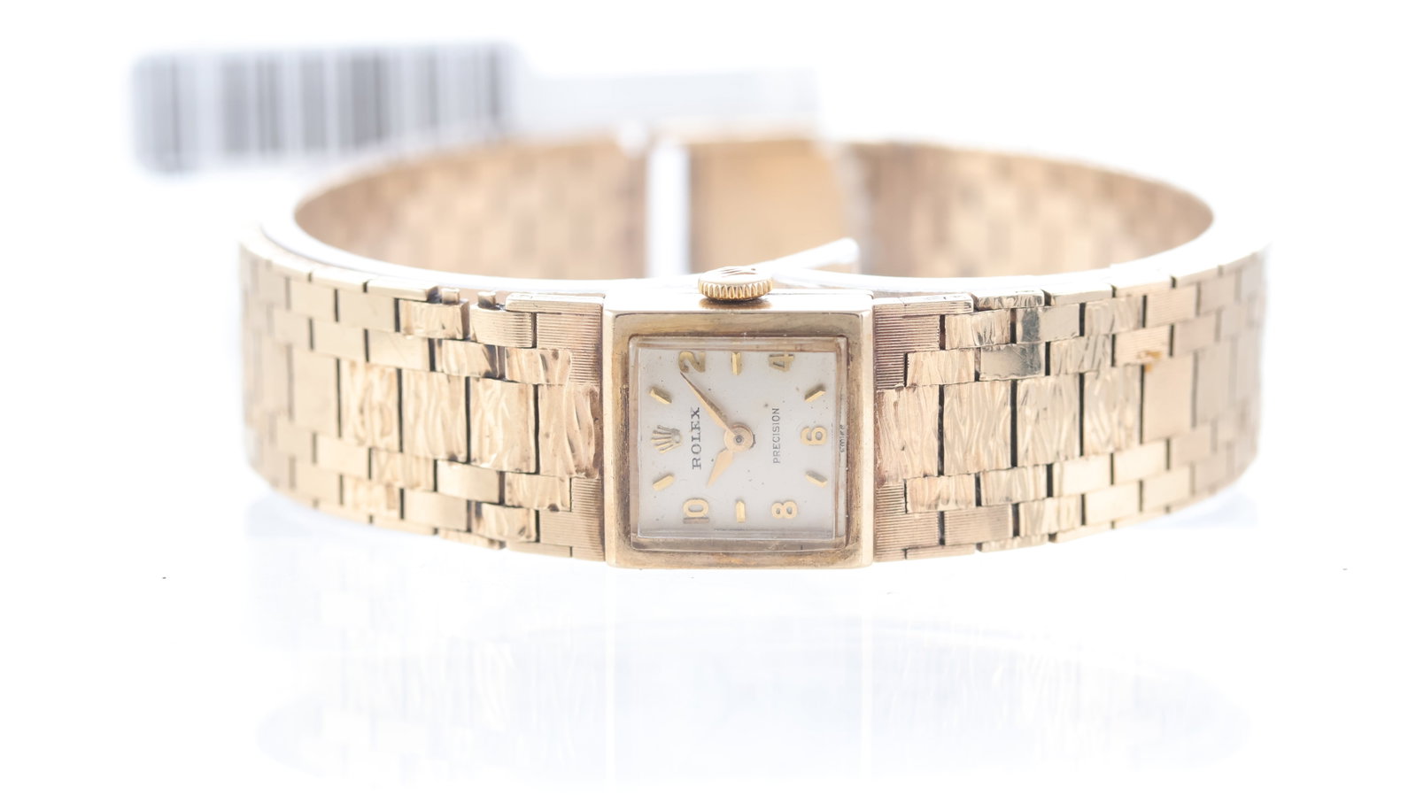 Vintage Ladies Rolex Precision 9ct Gold Manual Wind: Brand: RolexModel Name: PrecisionMovement type: Manual WindMovement calibre: Rolex 1401Dial shape: SquareDial colour: SilverDial features: Applied baton and arabic numeral hour markers.Case size: 15mm