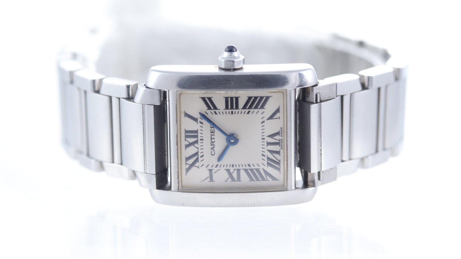 Cartier Tank Francaise Ref 2384: Brand: CartierModel Name: Tank FrancaiseReference: 2384Movement type: QuartzDial shape: SquareDial colour: WhiteDial features: Roman numeralsCase size: 21mm by 25mmCase material: Stainless steelCase f