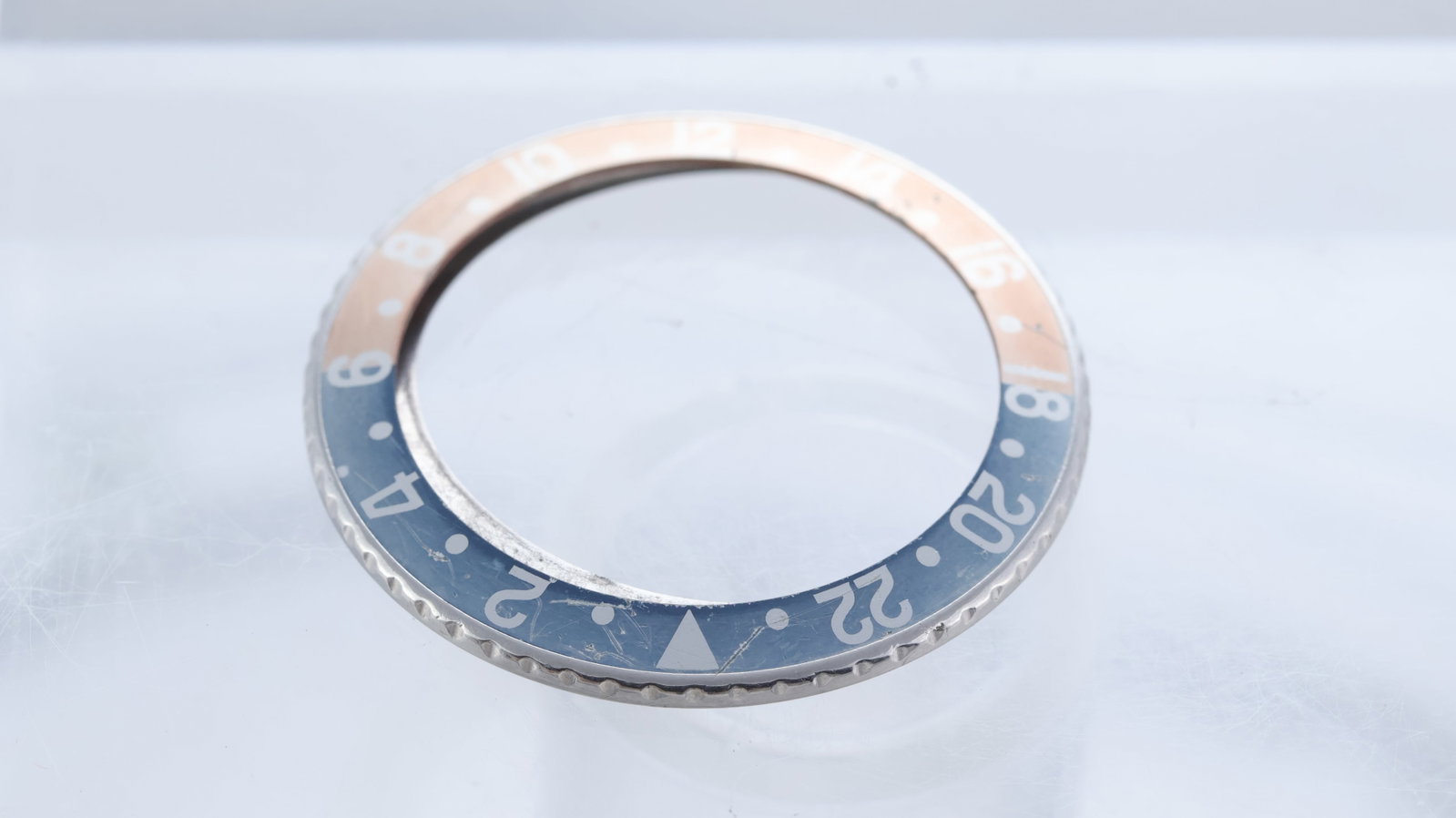 ROLEX GMT BEZEL AND INSERT + POUCH, faded Rolex GMT bezel, Red back, bezel and retaining ring, Green: ROLEX GMT BEZEL AND INSERT + POUCH, faded Rolex GMT bezel, Red back, bezel and retaining ring, Green Rolex pouch
