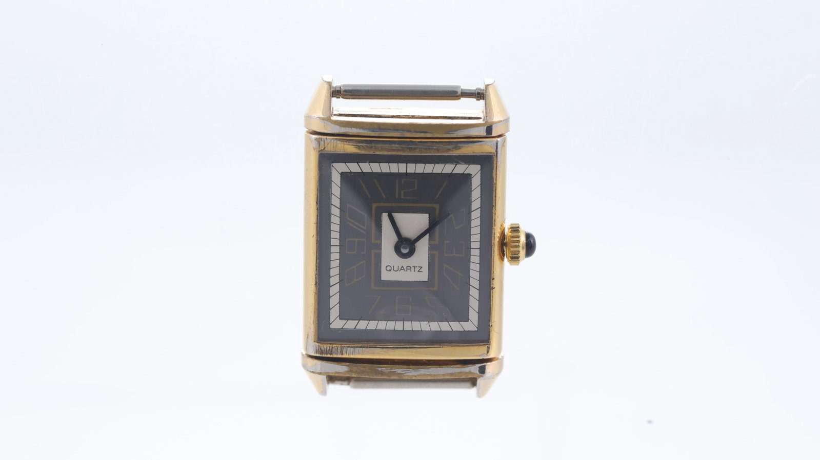 *To Be Sold Without Reserve* 'Reverso' Quartz Wristwatch: *To Be Sold Without Reserve* 'Reverso' Quartz Wristwatch, two tone dial with arabic numerals, 18mm by 28mm gold plated case, reversible case, quartz, Swiss Made, currently running.