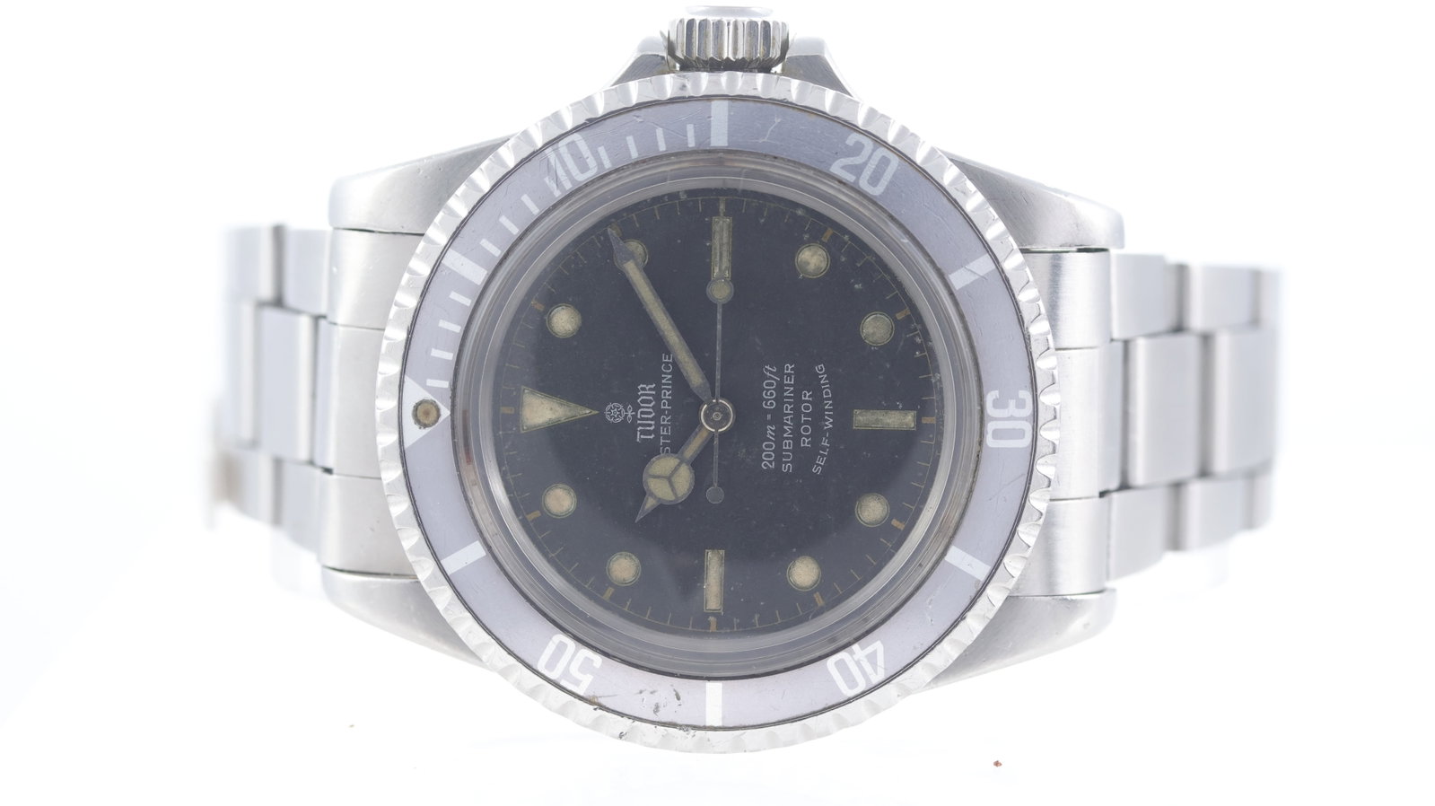 Vintage Tudor Oyster Prince Submariner PCG Ref 7928 Circa 1964: Brand: TudorModel Name: SubmarinerReference: 7928Movement type: AutomaticMovement features: Tudor signed movementYear: Circa 1964Dial shape: CircularDial colour: BlackDial features: Matte gilt dial wi