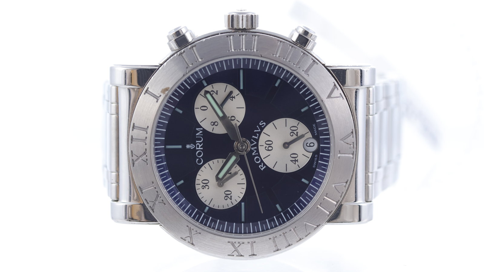 Corum Romvlvs Chronograph Ref 396.701.20: Brand: CorumModel Name: RomvlvsReference: 396.701.20Movement type: QuartzDial shape: CircularDial colour: BlueDial features: deep blue sunburst dial wth luminous baton hour markers. Silver sub dials. 