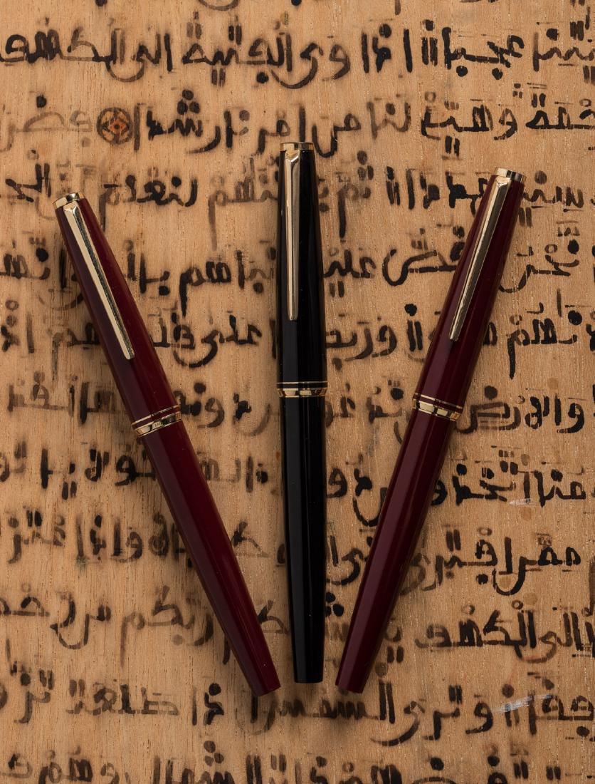 MONTBLANC: Lot of Three Black & Burgundy Fountain Pens,: Heading: Author: Montblanc Title: Lot of Three Piston-Filler Fountain Pens Place Published: Germany Publisher: Date Published: 1960s Description: Lot of three Montblanc pis