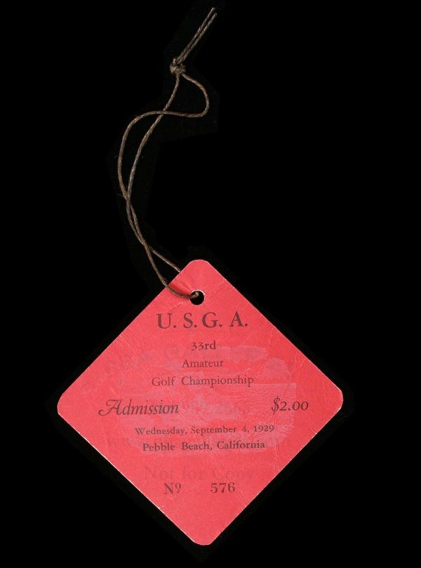 (Bobby Jones) 1929 US Amateur Championship ticket: Title: 1929 USGA Amateur Golf Championship ticket Author: ** Description: 3x3" red colored ticket lettered in black, original hole punch with string; faint cream pictorial image of Pebble Beach on fro