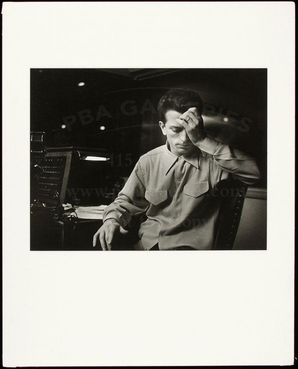 Original W. Eugene Smith photograph: Title: Guido Cantelli listening to recording of Hindemith's "Mathis der Maler" Author: Smith, W. Eugene (1918-1978) Description: Gelatin silver photograph. 10¼x13½, on mount 20x16.Rubberstamp on mou