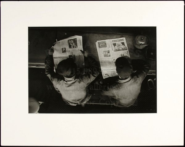 Eugene Smith photo Japanese men: Title: Hitachi, Ltd. - Two Men Reading the Newspaper Author: Smith, W. Eugene (1918-1978) Description: Gelatin silver photograph. 9¾x14½ plus margins, matted.Illustrated in "Japan...A Photographic E