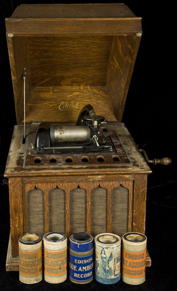 Edison Amberola 50 with 65 cylinders: Title: Edison Amberola 50 plus approximately 65 recorded cylinders Author: ** Description: Desktop model of the Edison Amberola 50, approximately 15x20x16". Plus approximately 65 cylinder recordings. 