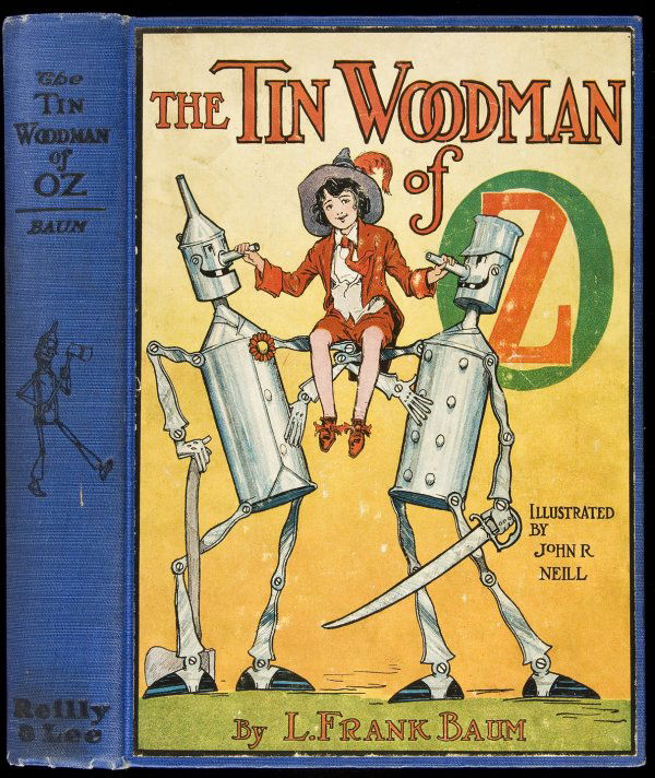 The Tin Woodman of Oz: Title: The Tin Woodman of Oz Author: Baum, L. Frank Description: 287, [1] pp. With 12 color plates & numerous black & white drawings by John R. Neill. 9x6½, blue cloth, color pictorial cover label; b