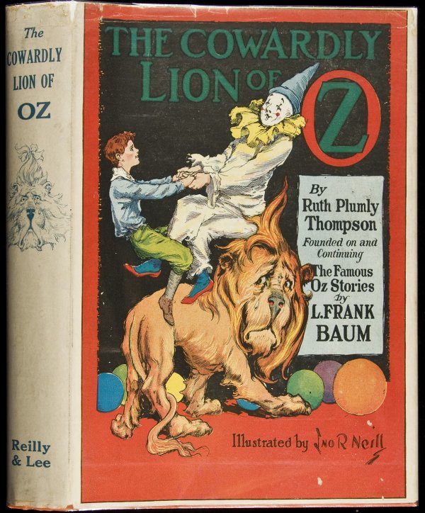 The Cowardly Lion of Oz with dust jacket: Title: The Cowardly Lion of Oz Author: Thompson, Ruth Plumly Description: 291 pp. Illustrations by John R. Neill. Orange cloth, pictorial endpapers, dust jacket. Reprint.Reprint circa 1933 without col