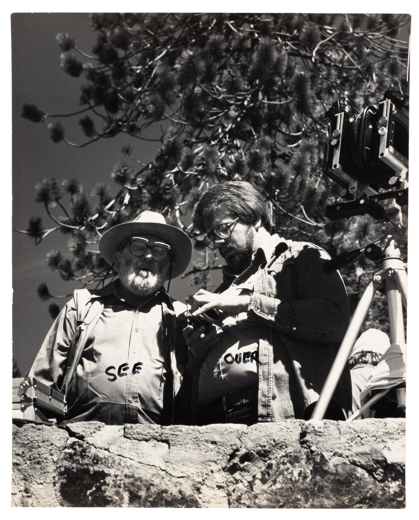 Signed by Ansel Adams at reverse: Heading: (Adams, Ansel) Author: Title: Original photograph of Ansel Adams with John Sexton Place Published: No place Publisher: Date Published: No date Description: Gelatin silv