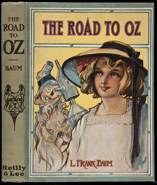 L. Frank Baum The Road to Oz: Title: The Road to Oz Author: Baum, L. Frank Description: 261 pp. Illustrated throughout with black & white drawings by John R. Neill. 9x6½, green cloth, color pictorial cover label.Later reprint wit