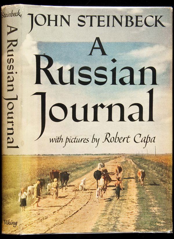 John Steinbeck A Russian Journal 1st Edition: Title: A Russian Journal Author: Steinbeck, John Description: Illustrated with 70 photographs by Robert Capa. 9½x6½, light grayish-green cloth, beige spine, lettered in dark blue, color pictorial ja