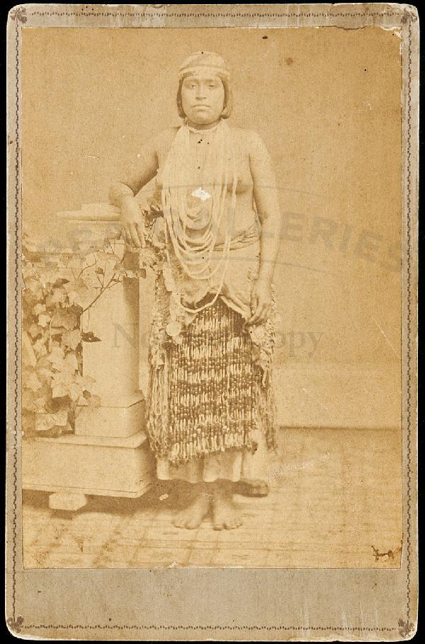 373 Photo of barebreasted Indian woman with beads