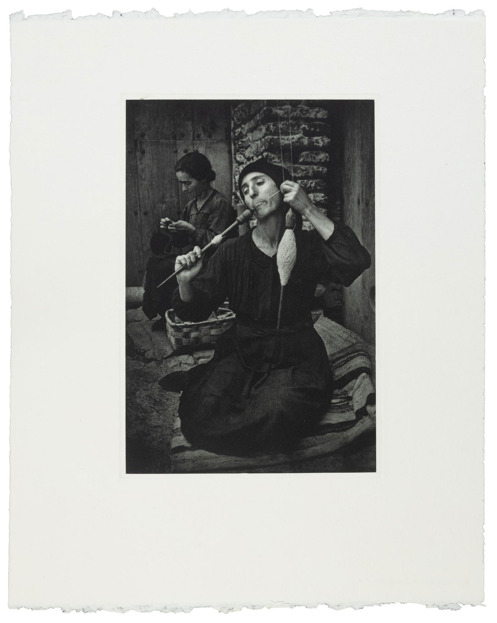 The Spinner, hand-pulled photogravure: Heading: Author: Smith, W. Eugene Title: The Spinner, 1951 Place Published: Printed in Switzerland Publisher:W. Eugene Smith Estate Date Published: [1985] Description: Hand