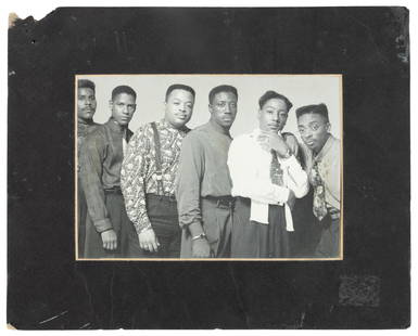 Photograph of Spike Lee, Denzel Washington, et al.: Heading: (African-American, 1990)Author: Title: Photograph of the cast of Mo' Better Blues Place Published: Publisher: Date Published: 1990 Description: Gelatin silver print mounted in mat. Image: