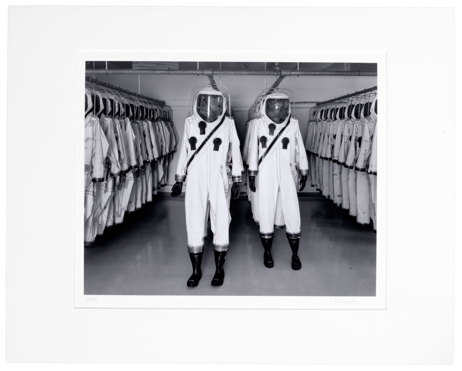 Scape Suits...signed by John Sexton: Heading: Author: Sexton, John Title: Scape Suits, Kennedy Space Center, Florida, 1998 Place Published: Publisher: Date Published: 1998; print: 2021 Description: Gelatin silve