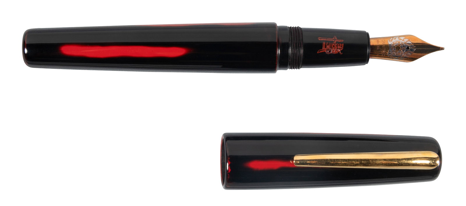 DANI TRIO Black Lacquer Fountain Pen, Mottled Pattern: Heading: Maker: Dani Trio Lot Name: Black Lacquer Fountain Pen, Red Streak Pattern Place: Date: Description: Black lacquer fountain pen, red streak pattern, gold-plated clip, flat captop a