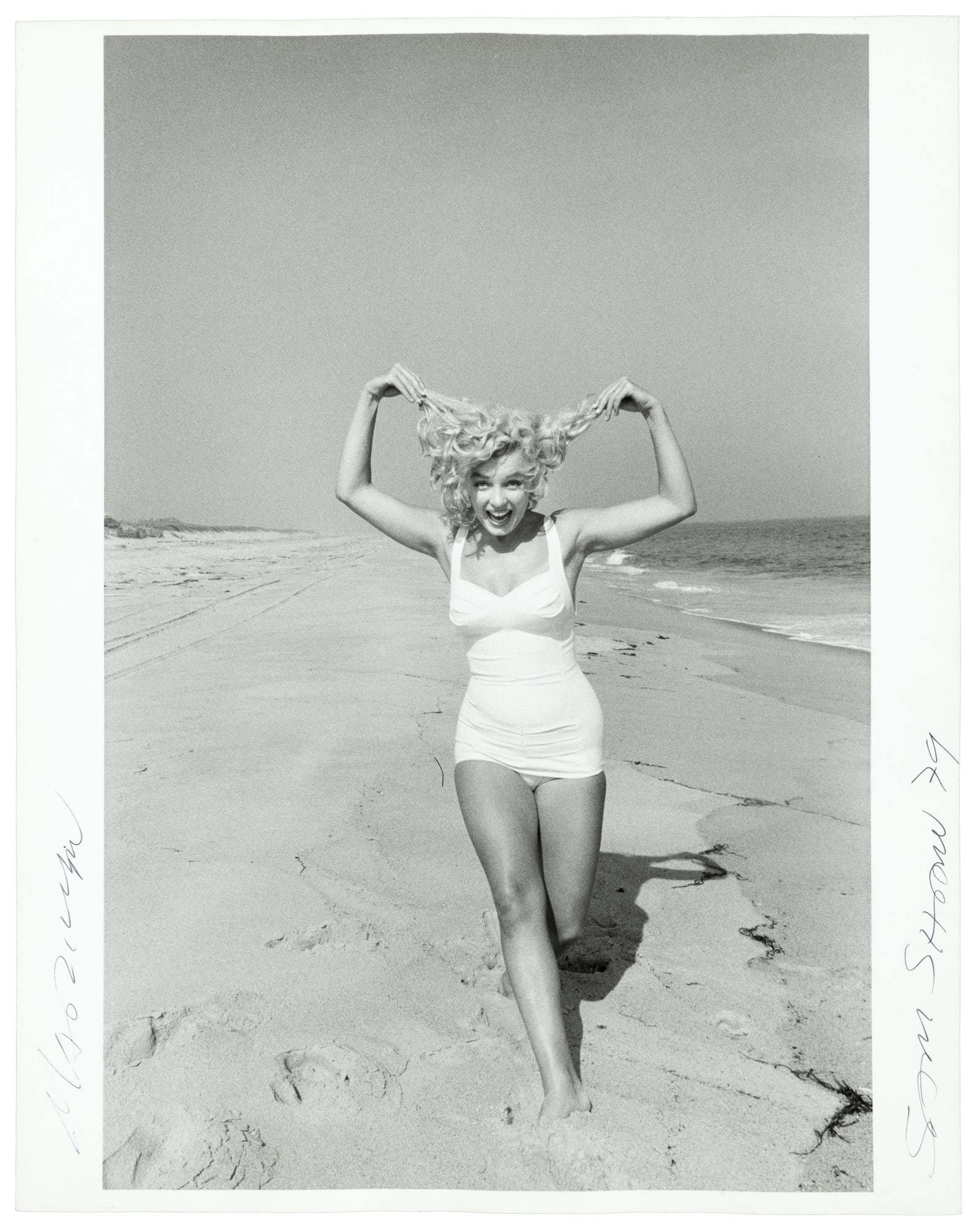 Marilyn Monroe at the Beach, signed by Sam Shaw (1 of 2)