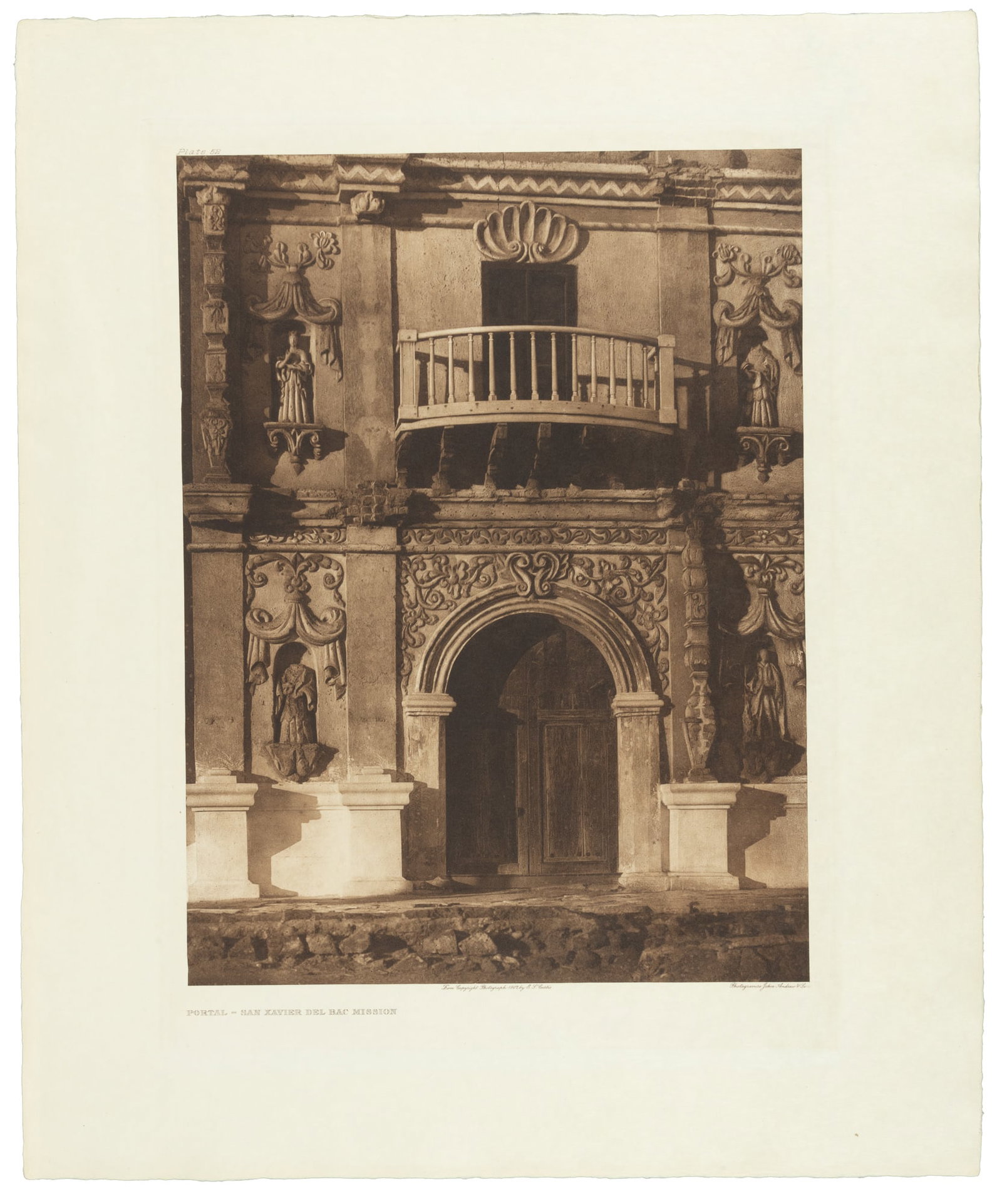 San Xavier Del Bac Mission, Edward S. Curtis photogravure: Heading: (Curtis, Edward S. - Plate 52) Author: Curtis, Edward S. Title: Portal â€“ San Xavier Del Bac Mission Place Published: [Boston] Publisher:John Andrew & Son Date Published: 1907<