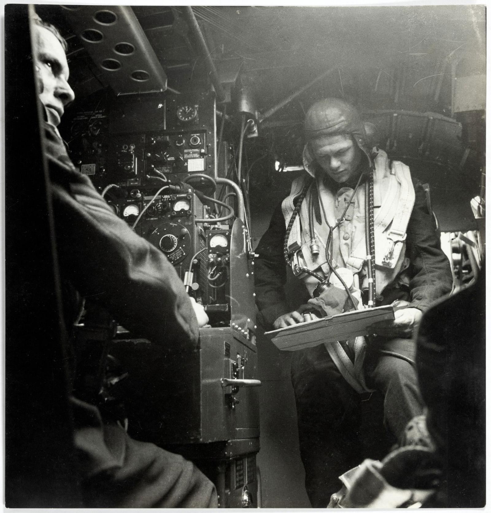 Royal Air Force Pilots in WWII by Cecil Beaton: Heading: Author: Beaton, Cecil Title: Untitled (Royal Air Force: Pilot and Co-Pilot in Cockpit), c. 1941 Place Published: Publisher: Date Published: c. 1940s Description: Vintage