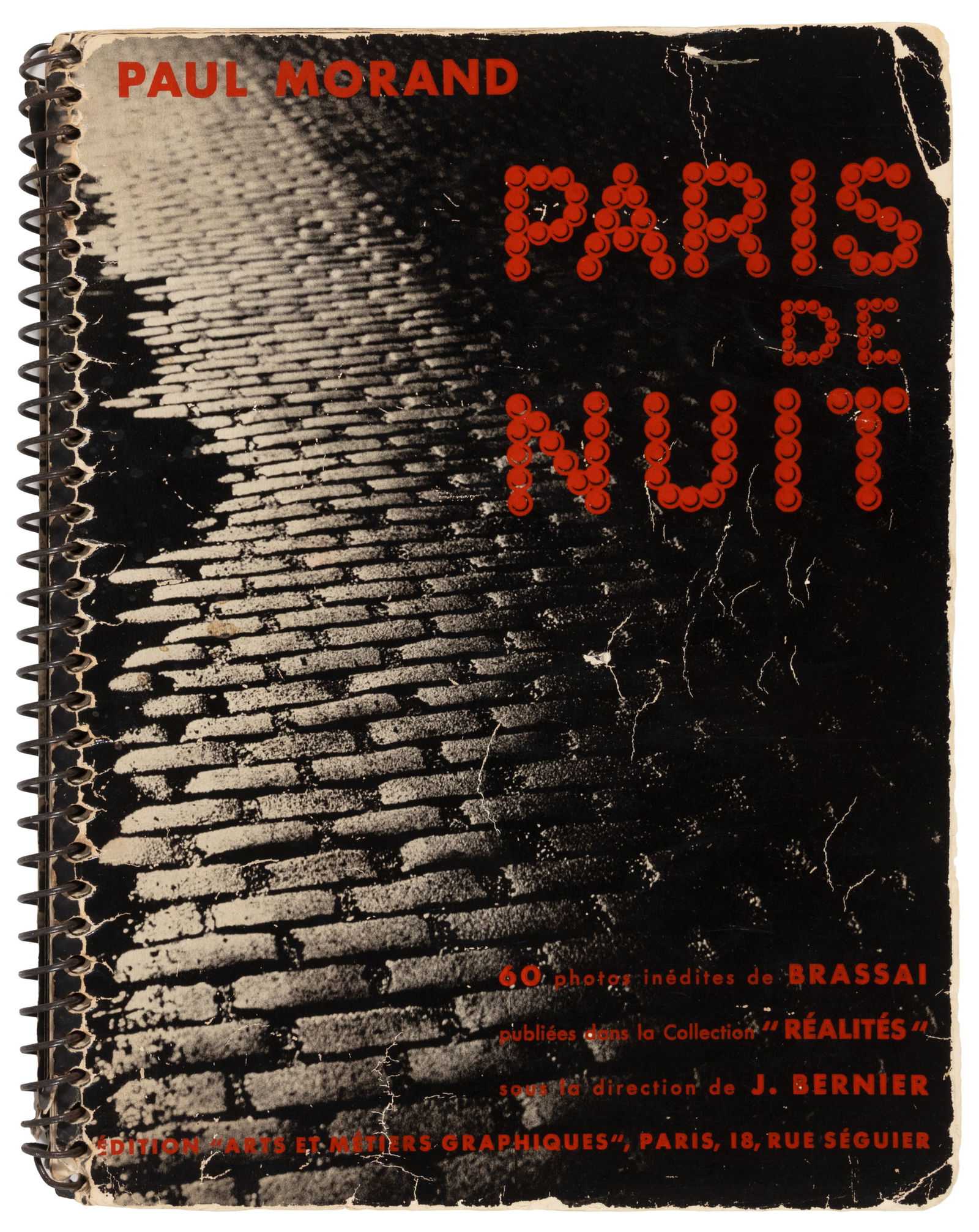 Paris at Night through Brassai's lens: Heading: (Brassai) Author: Morand, Paul Title: Paris de Nuit Place Published: Paris Publisher:Arts et MÃ©tiers Graphiques Date Published: 1933 Description: 62 pp. Illustrated from 6