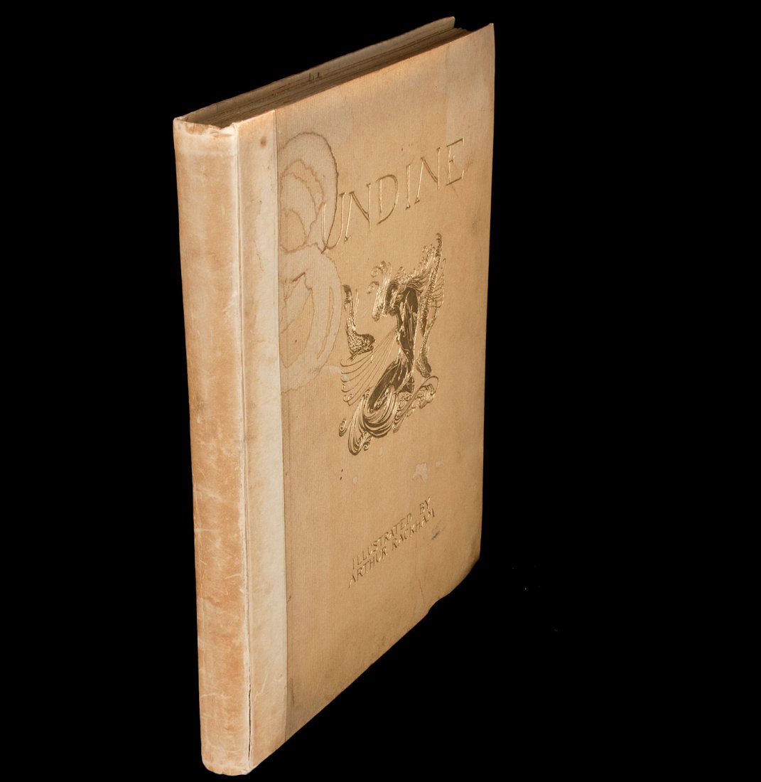 Undine One of 250 copies signed by Arthur Rackham: Title: Undine Author: Fouqué, De La Motte Description: Illustrated by Arthur Rackham, including 15 tipped-in color plates on brown paper, printed guards. (4to), parchment-backed boards, stamped in gi