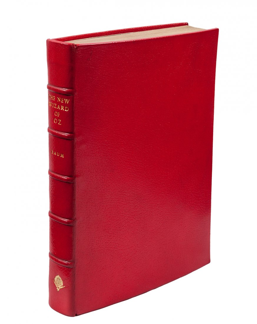 New Wizard of Oz finely bound 5th edition: Title: The New Wizard of Oz Author: Baum, L. Frank Description: [viii], 208 pp. Illustrated in color by W.W. Denslow, including 8 color plates. 9x6¾, pictorial label on that belongs on front cover, i
