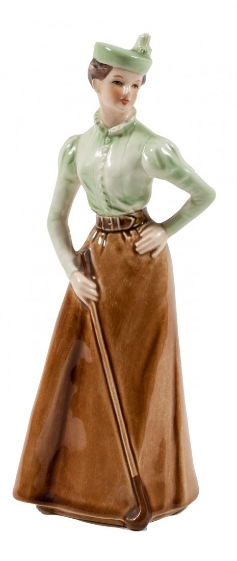 Porcelain figurine of a lady golfer by Goebel: Heading: (Figurine - Porcelain) Author: Title: "On the Fairway" - 9 inch porcelain lady golfer figurine Place Published: West Germany Publisher:Goebel Date Published: Description: