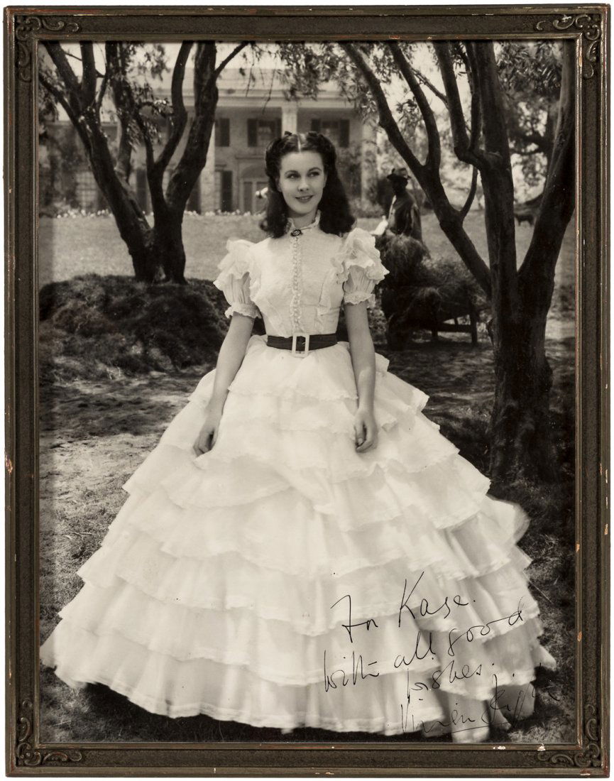 Inscribed photograph of Vivien Leigh: Heading: Author: Leigh, Vivien Title: Photograph Signed and Inscribed by Vivien Leigh, the actress posed in front of the mansion at Tara in Gone With the Wind Place Published: No place Publisher: <