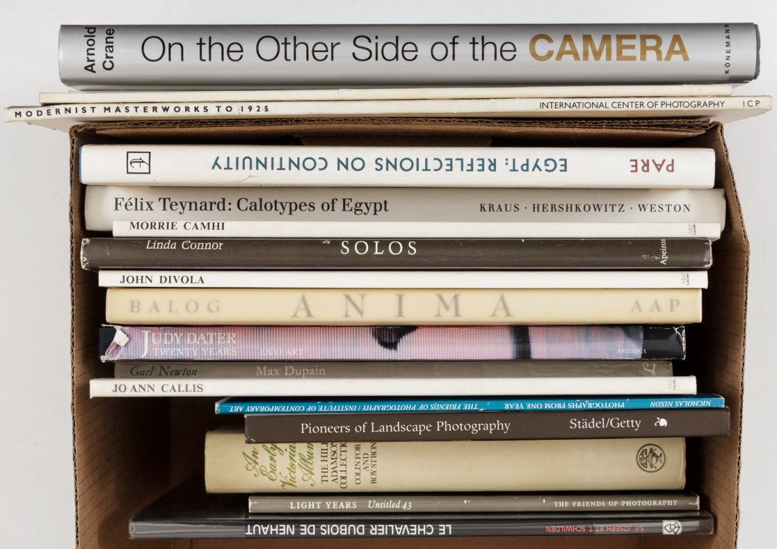 Photography shelf: Heading: (Photography) Author: Title: Shelf of books on photography, including Man Ray, Arnold Crane et al. Place Published: Publisher: Date Published: Various dates Description: