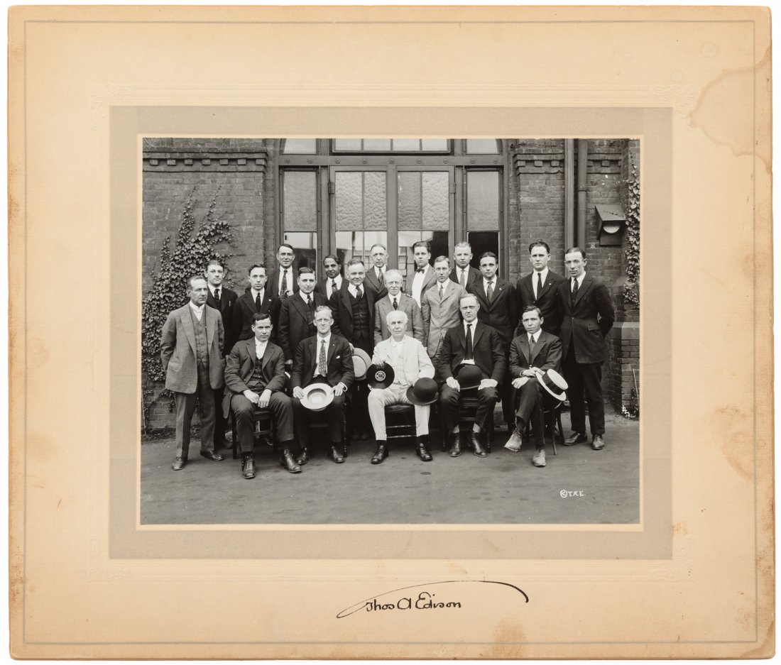Signed group photograph of Thomas Edison: Heading: Author: Edison, Thomas A. Title: Original photograph of Thomas Edison with a group of employees at outside his West Orange, New Jersey laboratory Place Published: West Orange, New Jersey Publ