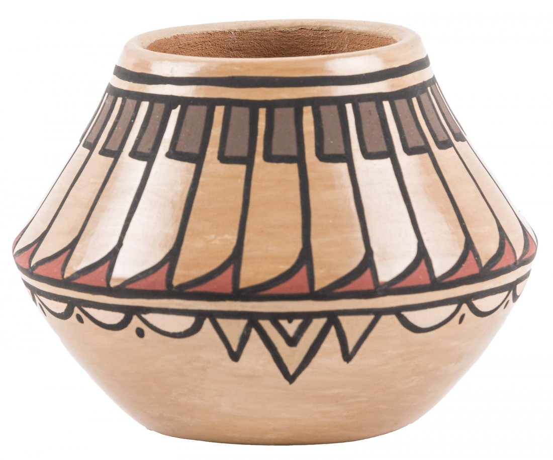 Small pot by Minnie Vigil Santa Clara Pueblo: Heading: (Santa Clara) Author: Vigil, Minnie Title: Small vase by Minnie Vigil Place Published: New Mexico Publisher:Santa Clara Pueblo Date Published: No date Description: